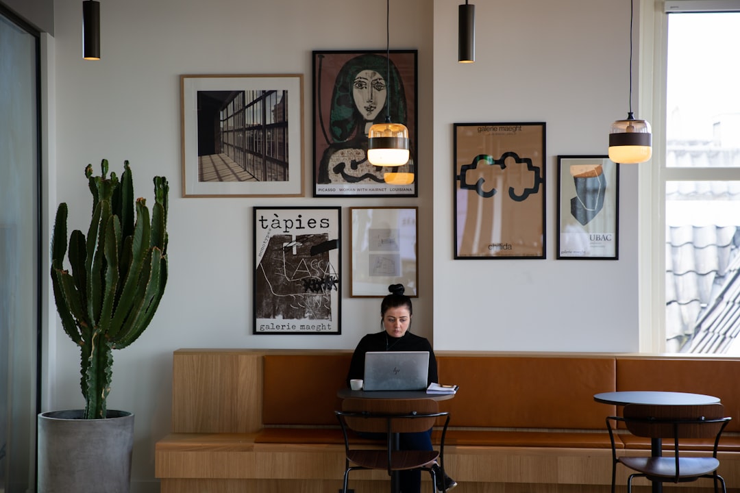 A girl working on her laptop in the office